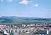 Louny (east) city before • Czech central mountains • in centre picture Mt. Milesovka 837 m
